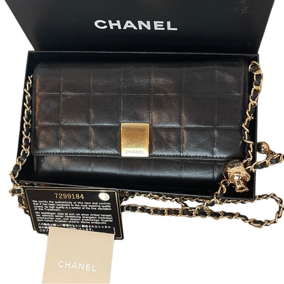 CHANEL Handbags - CHANEL Black and Gold Quilted Wallet